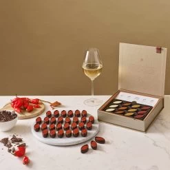 Neuhaus Pralines Champagne Pairing Selection - 24 Pieces 12 Neuhaus Pralines Champagne Pairing Selection - 24 Pieces -Sous Chef Kitchenware NE0016 NeuhausPralinesChampagnePairingSelection 24Pieces lifestyle3